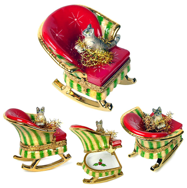 Limoges box cat in rocking chair with tinsel