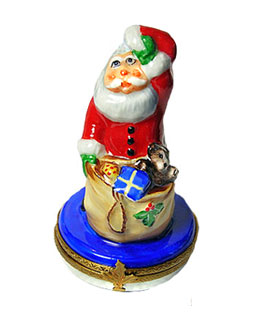 Limoges box Santa cooling his brow with hat off