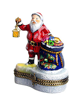 Limoges box Santa holding lantern with pack of toys