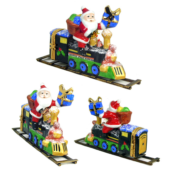 santa riding train limoges box