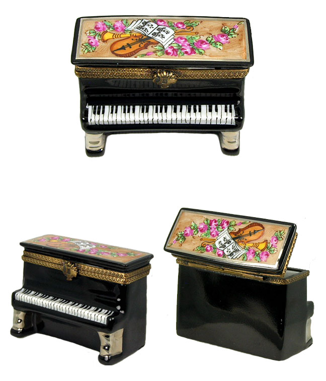 black standup piano with musical decor and flowers
