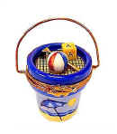 Limoges box beach pail with sand rake and toys