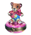 Small teddy bear with polka dot bow Limoges box