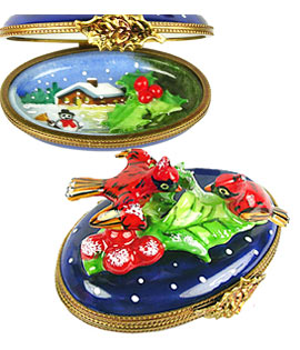 Limoges box cardinals on snowy background with picture inside