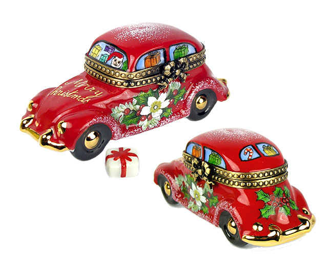 Santa delivering gifts in red VW Limoges box