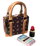 designer logo square purse with lipstick and cell phone